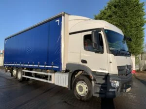 2019 Mercedes Actros 2530 Curtainsider, 26 Tonne, 300bhp, Euro 6, Automatic Gearbox, Single Sleeper Cab, Palfinger Tuckaway Tailift (1500KG Capacity), Barn Doors, Steering Wheel Controls, Sun Roof, Low Mileage, Warranty also Available.