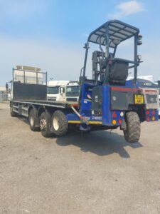 2023-daf-cf340-26t-6x2-flatbed-moffett-kit-rigid-1000007090-rotated